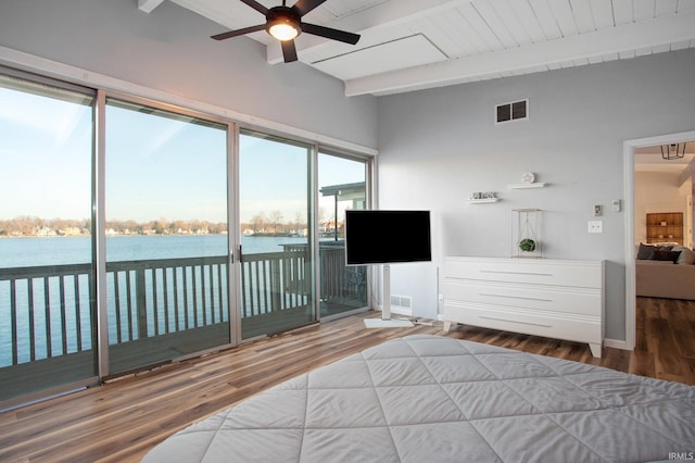 bedroom with access to exterior, wood finished floors, and ceiling fan