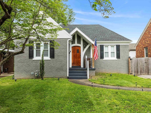 541 S Kelsey Ave, Evansville, IN 47714 - view of front of home with brick siding and a shingled roof