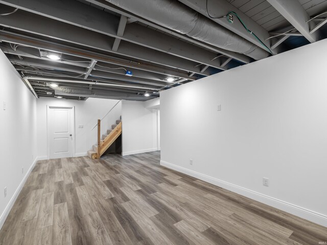 541 S Kelsey Ave, Evansville, IN 47714 - finished basement with wood finished floors, stairs, and baseboards