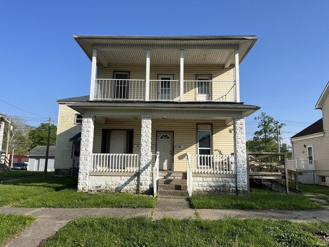 115 E 2nd St, Peru, IN 46970 - view of front of property featuring a balcony and a porch