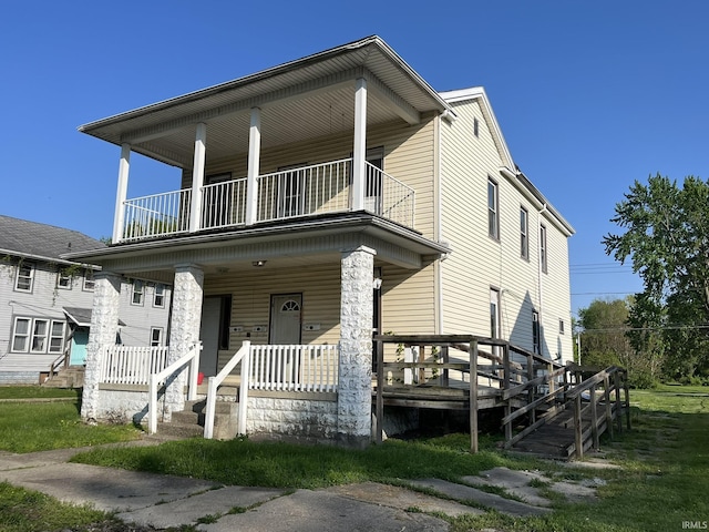 115 E 2nd St, Peru, IN 46970 - view of front of property with a balcony and a porch
