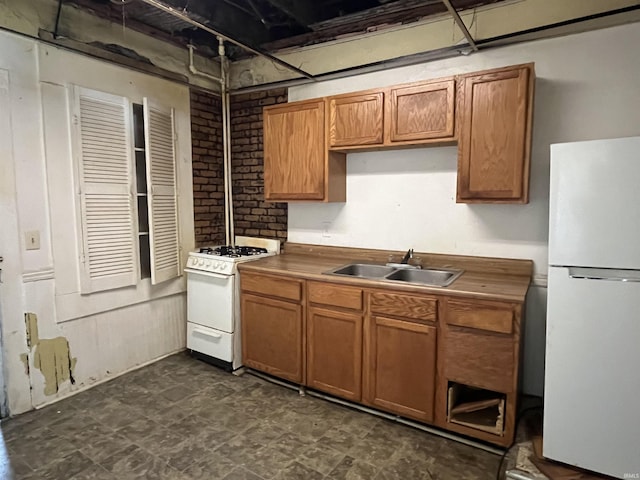 115 E 2nd St, Peru, IN 46970 - kitchen featuring white appliances, brown cabinets, and dark floors