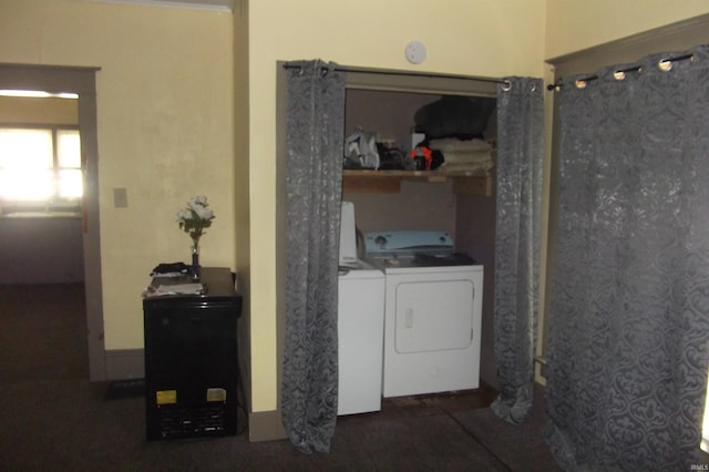 laundry room with independent washer and dryer