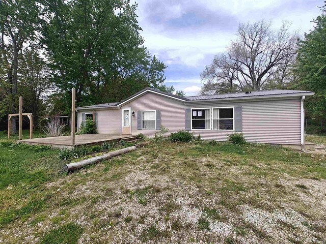 78 Ems B6 Ln, Leesburg, IN 46538 - view of front of home with metal roof and a deck