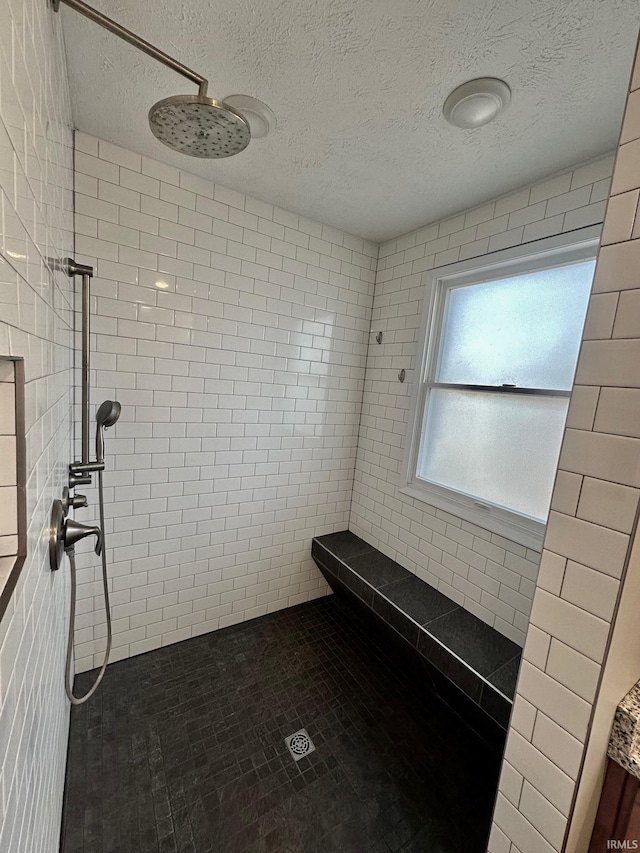1700 W Taylor St, Kokomo, IN 46901 - full bathroom featuring a tile shower and a textured ceiling