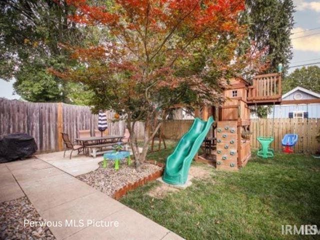 1700 W Taylor St, Kokomo, IN 46901 - view of play area featuring a patio area