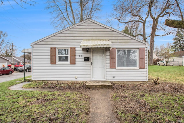 bungalow with a front yard