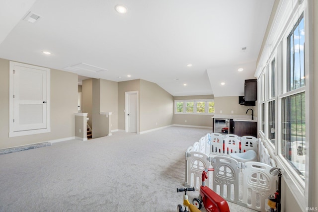18015 Tullymore Ln, Leo, IN 46765 - playroom with beverage cooler, carpet flooring, baseboards, recessed lighting, and attic access