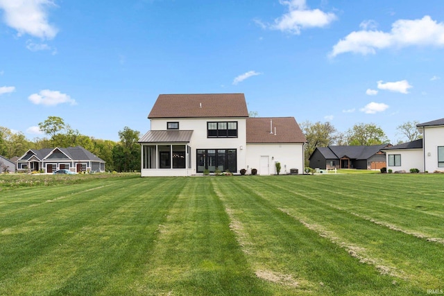 18015 Tullymore Ln, Leo, IN 46765 - back of house with a sunroom and a yard