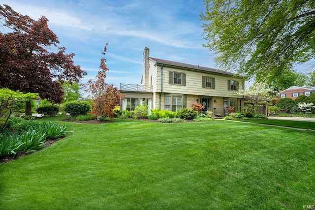 1327 E Wayne St, South Bend, IN 46615 - view of front facade featuring a chimney and a front lawn