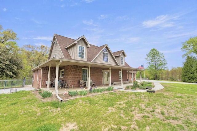country-style home with brick siding and roof with shingles