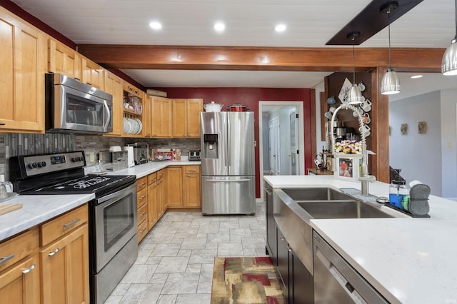 kitchen featuring appliances with stainless steel finishes, stone finish flooring, decorative backsplash, beam ceiling, and light countertops