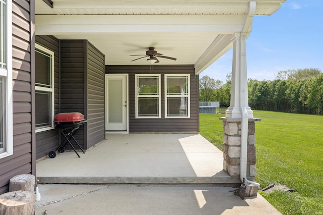 view of patio with a ceiling fan and grilling area