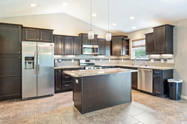 kitchen featuring stainless steel appliances, lofted ceiling, dark brown cabinets, open shelves, and a center island