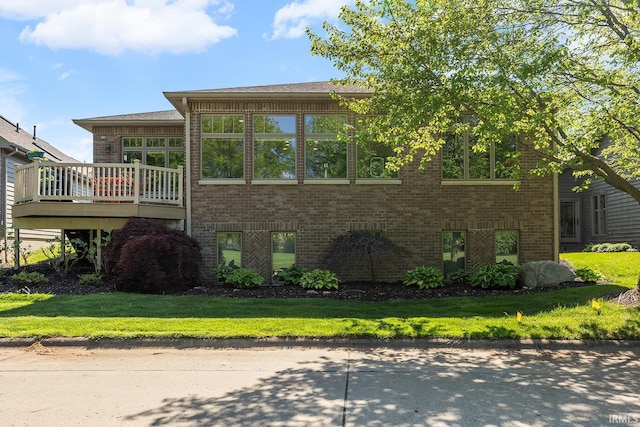 3622 Glenridge Ln, West Lafayette, IN 47906 - back of property with brick siding and a wooden deck