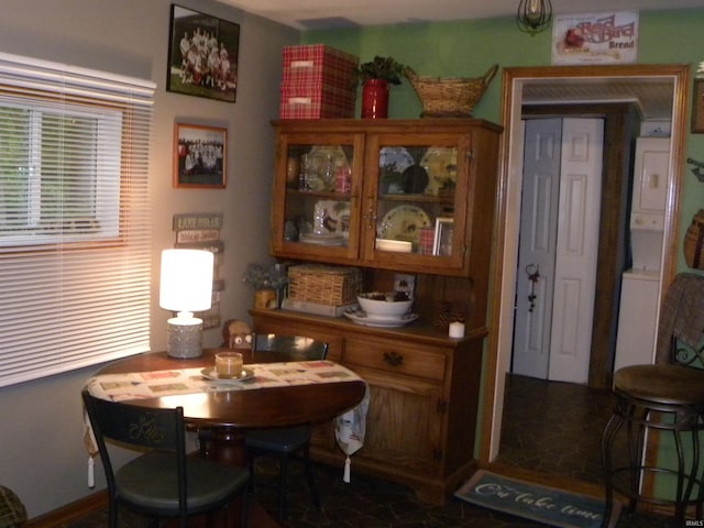 5161 Orange Grove Rd, Gosport, IN 47433 - dining space with estacked washer and dryer