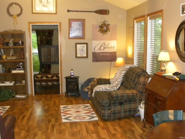 5161 Orange Grove Rd, Gosport, IN 47433 - sitting room with wood finished floors, lofted ceiling, and a wood stove