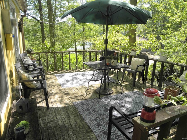 5161 Orange Grove Rd, Gosport, IN 47433 - wooden deck with outdoor dining space