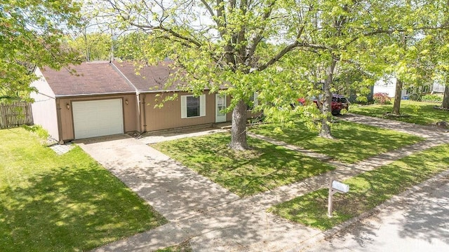 view of front of home with concrete driveway and a garage
