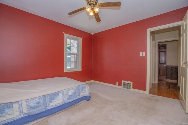 927 S Lombard Ave, Evansville, IN 47714 - carpeted bedroom featuring baseboards and a ceiling fan