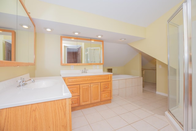 927 S Lombard Ave, Evansville, IN 47714 - full bathroom with a shower stall, tile patterned flooring, two vanities, and a bath