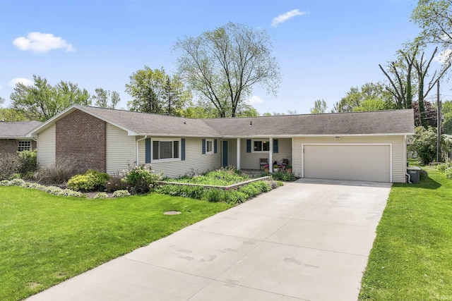 625 Cumberland Ave, West Lafayette, IN 47906 - single story home featuring an attached garage, driveway, and a front lawn