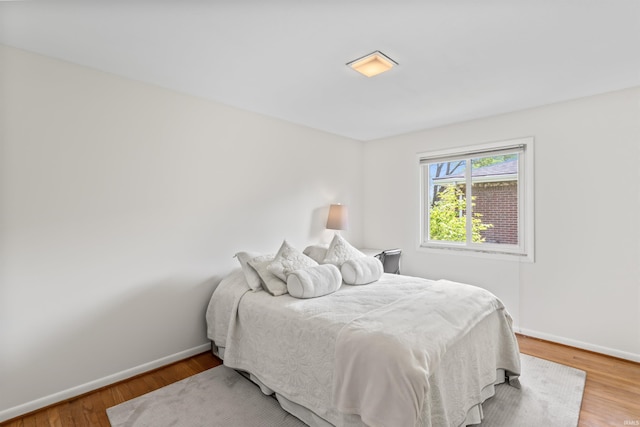 625 Cumberland Ave, West Lafayette, IN 47906 - bedroom featuring baseboards and wood finished floors