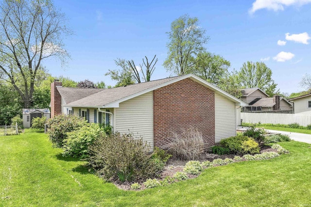 625 Cumberland Ave, West Lafayette, IN 47906 - view of side of home featuring a chimney