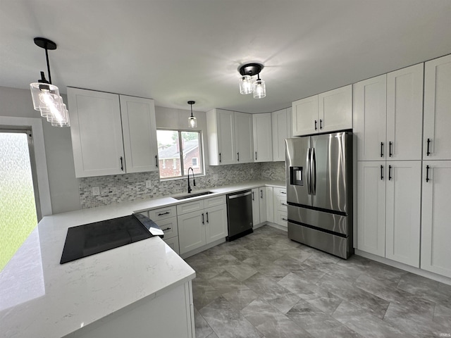 100 Lincoln St, Plainfield, IN 46168 - kitchen featuring stainless steel fridge, a sink, dishwashing machine, backsplash, and white cabinets