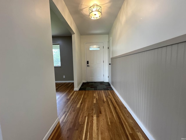 100 Lincoln St, Plainfield, IN 46168 - doorway to outside with dark wood-style floors and baseboards