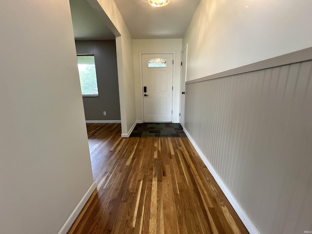100 Lincoln St, Plainfield, IN 46168 - entryway with dark wood-style flooring and baseboards