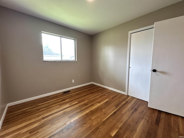 100 Lincoln St, Plainfield, IN 46168 - unfurnished room featuring wood finished floors and baseboards