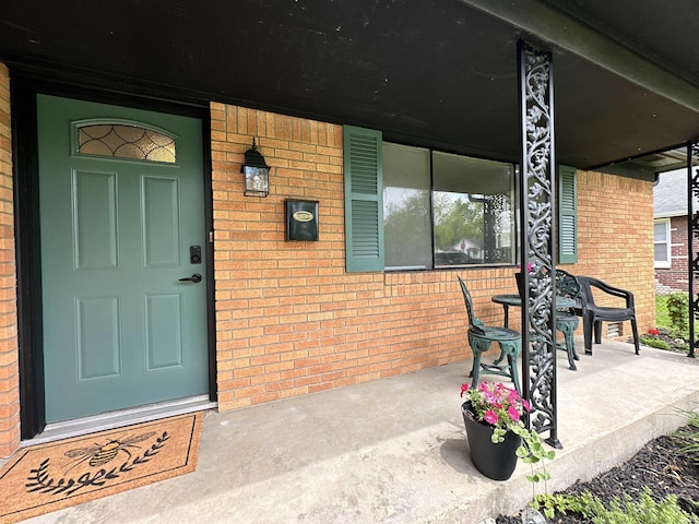100 Lincoln St, Plainfield, IN 46168 - entrance to property with covered porch and brick siding