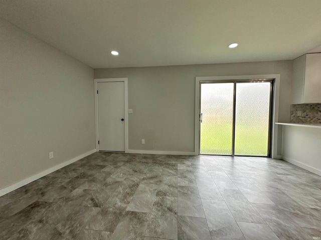 100 Lincoln St, Plainfield, IN 46168 - unfurnished room with baseboards and recessed lighting