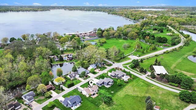 7828 E Cherokee Rd, Syracuse, IN 46567 - aerial view of property's location with a large body of water and nearby suburban area