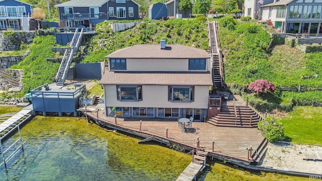 aerial view of residential area with a nearby body of water