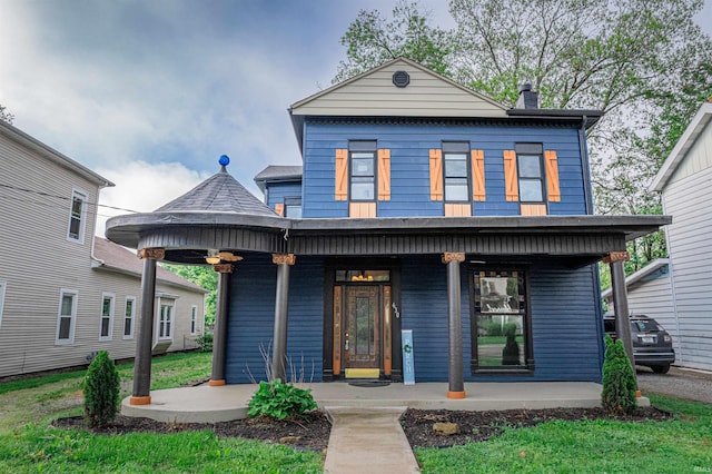 630 E Water St, Mount Vernon, IN 47620 - view of front of property with covered porch and a chimney