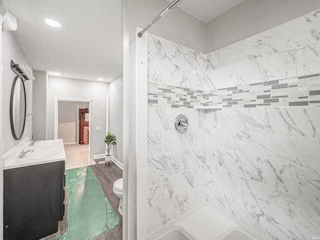 630 E Water St, Mount Vernon, IN 47620 - full bath featuring a shower, wood finished floors, vanity, toilet, and recessed lighting