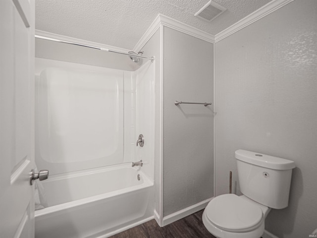 630 E Water St, Mount Vernon, IN 47620 - bathroom with a textured ceiling, wood finished floors, ornamental molding, toilet, and shower / bathtub combination