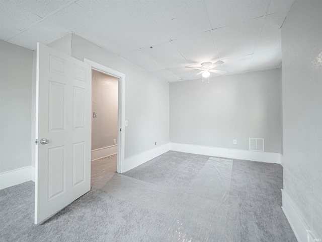 630 E Water St, Mount Vernon, IN 47620 - empty room with carpet flooring, a paneled ceiling, a ceiling fan, and baseboards