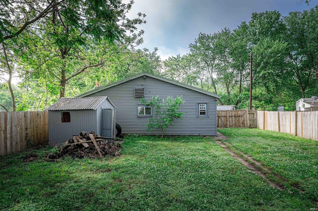 630 E Water St, Mount Vernon, IN 47620 - rear view of house with an outdoor structure and a storage shed