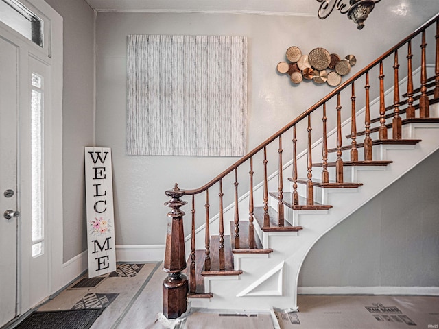 630 E Water St, Mount Vernon, IN 47620 - entryway with baseboards, stairs, and arched walkways