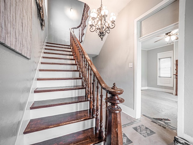 630 E Water St, Mount Vernon, IN 47620 - stairway featuring baseboards, ceiling fan, a chandelier, and ornamental molding