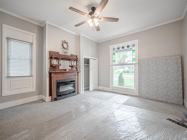 630 E Water St, Mount Vernon, IN 47620 - unfurnished living room featuring ceiling fan, crown molding, carpet floors, and baseboards