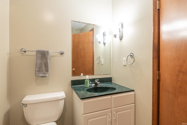 half bath with toilet and vanity