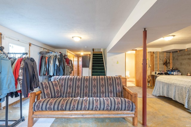 bedroom with concrete flooring