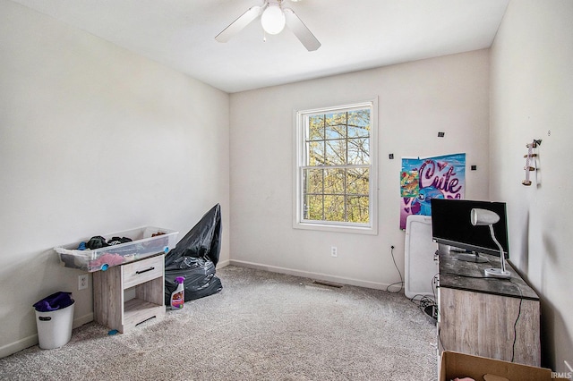 office featuring ceiling fan, carpet flooring, and baseboards