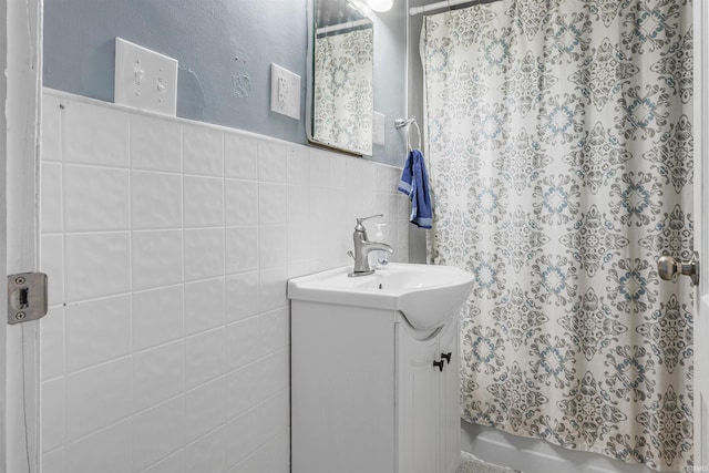 bathroom with vanity and wainscoting
