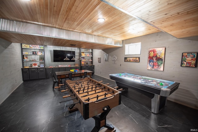 playroom with baseboards and wooden ceiling