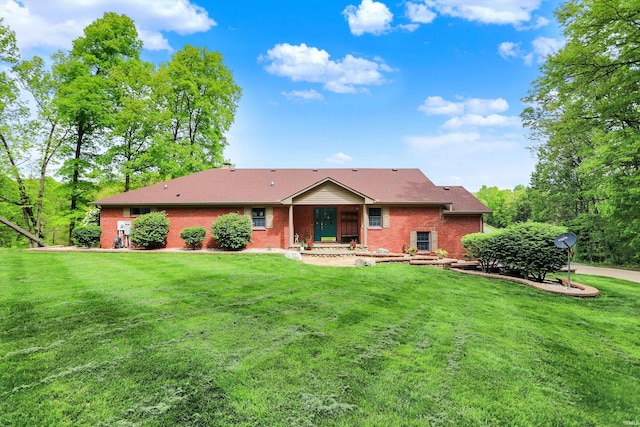 5571 Poff Rd, Martinsville, IN 46151 - rear view of property with brick siding and a lawn